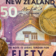NZ Currency NZD Fifty Dollar Note and NZ Coins.